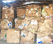 Cardboard Squares in container at Recycling Center
